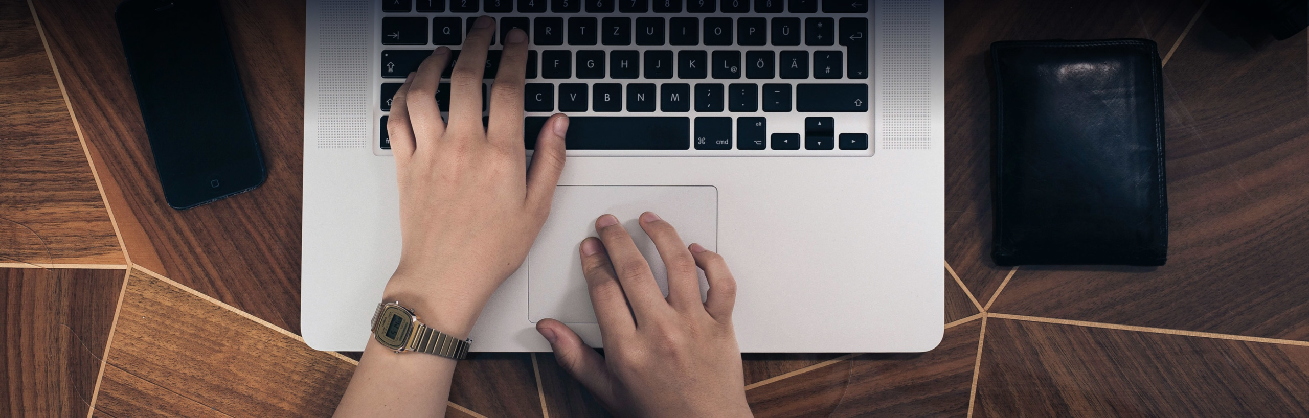 hand on laptop